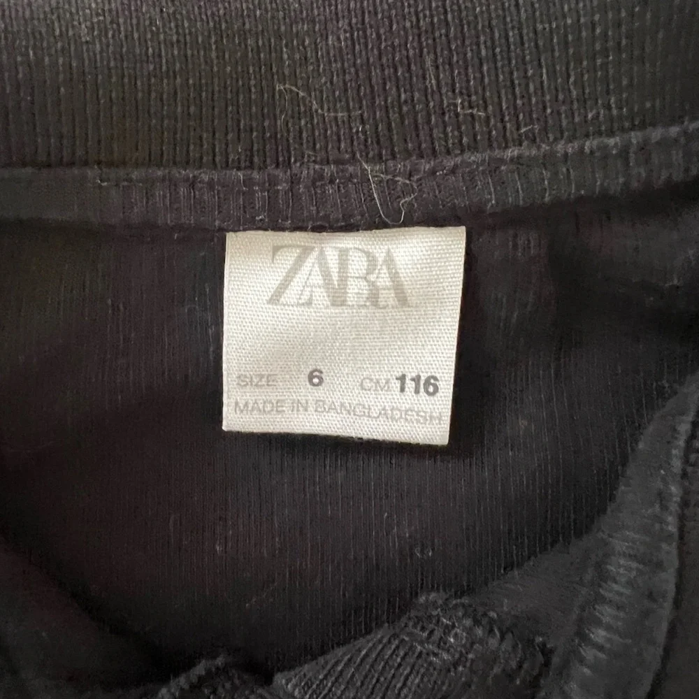 Zara | Black ribbed long sleeve polo shirt size 6